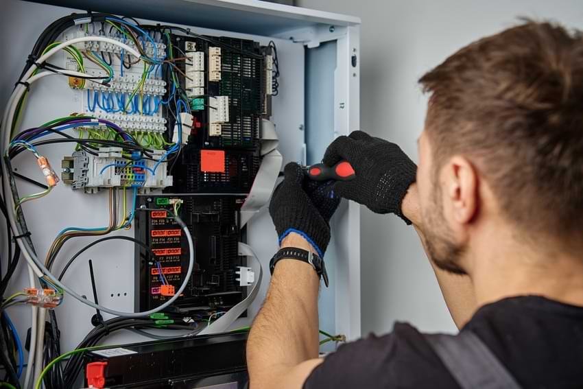 Man Fixing the System